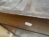 a wooden box that is sitting on the floor