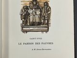 an open book with a drawing of a group of people on it