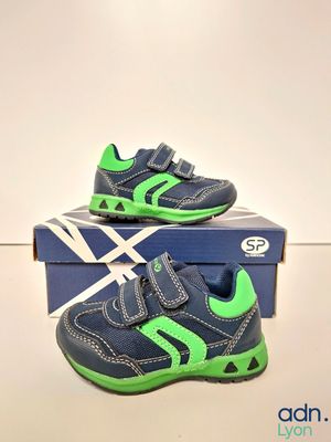 a close up of a pair of shoes on a box
