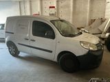 a white van that is parked in a garage