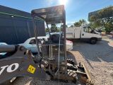 an image of a forklift parked in a parking lot