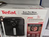 une boîte de « Tefa Easy Fry Mega » au supermarché