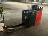 a forklift truck with a fork on it in a warehouse