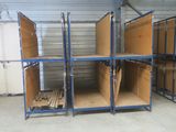three shelves with cardboard boxes stacked on them in a warehouse