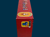 a red box with stickers on it sitting on a table