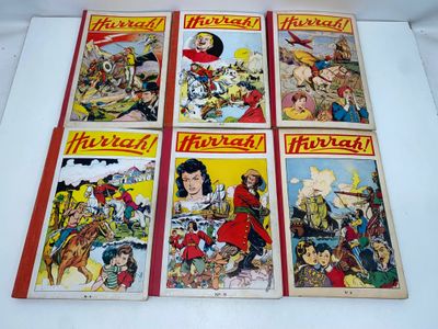 Quatre bandes dessinées anciennes pour enfants sont exposées sur une table