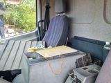 two seats in the back of a truck with a view of the back of the truck