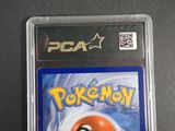 the game is in a plastic case on a black surface