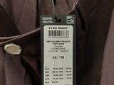 the back of a brown pants with a label on it