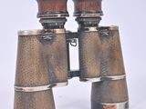 a pair of binoculars that are sitting on a table