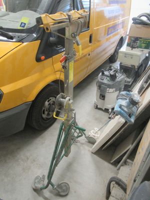 a yellow van that is parked in a garage