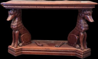 Console en acajou sculpté. Le piètement avant en forme de de…