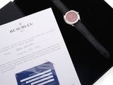 the watch is in a black box with a credit card in it