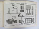 an old book with a drawing of a machine on it