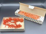 two boxes of carrots in a box on a table