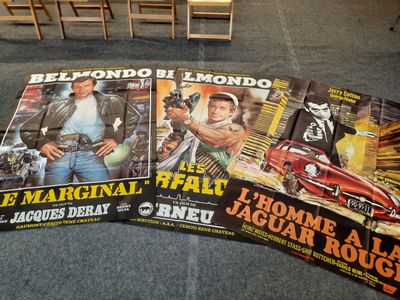 Trois affiches de ces célèbres films d'action sont exposées dans une pièce