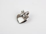 a silver heart charm on a white background