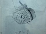 pencil drawing of a hat on a piece of paper with writing on it