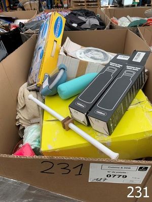 a cardboard box full of household items in a store