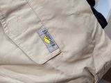 a bag with a banana patch on it sitting on a chair