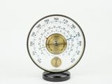 a close up of a thermometer on a white background
