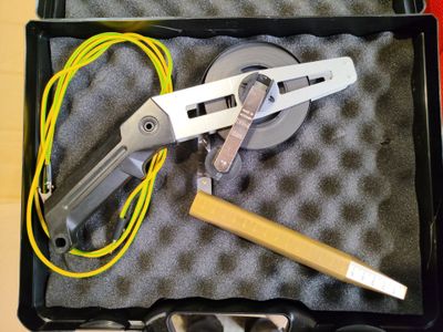 a tool in a case that is sitting on a table
