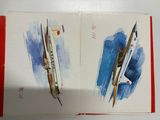 a book with a drawing of a plane and a picture of a plane