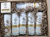 une boîte contenant de nombreuses bouteilles de lotion