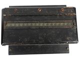 an old radio sitting on top of a wooden stand