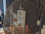 a basket hanging from the ceiling in a room
