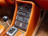 a dashboard of a car with a radio in it