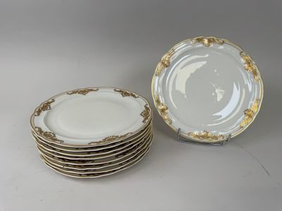 several plates are stacked on top of each other on a table