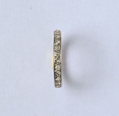 Alliance américaine en or gris 18K(750/00) sertie d'une lign…