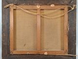 an old picture frame with a rope hanging from it ' s side