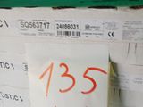 a stack of boxes with a price tag on them