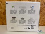 the back of a box with a picture of a wii controller in it