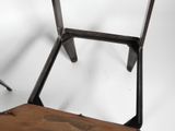 a chair that is made out of wood and metal