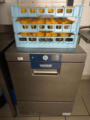 a dishwasher that has a bunch of oranges in it