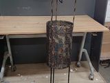 a lamp that is sitting on a stand in the room