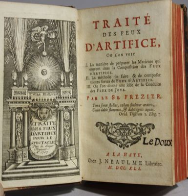 an open book with a picture of a statue in the middle