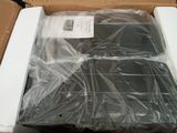 a box with a laptop in it sitting on a table