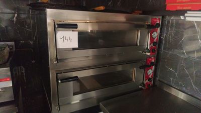 an image of a commercial oven in a kitchen