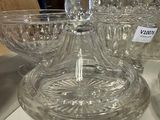 a lot of empty glass bowls on a table