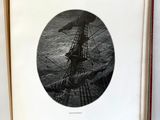 un livre sur lequel figure la photo d'un homme dans un bateau
