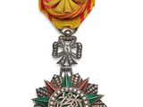 l'image d'une médaille surmontée d'une étoile