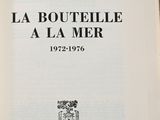 an open book with a picture of a coat of arms and a coat of arms