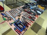 many different tools on a table in a room