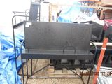 an image of a stove that is sitting in a pile