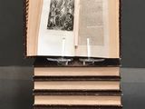 books stacked on top of each other on a table