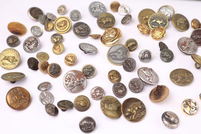 a lot of coins that are on the table